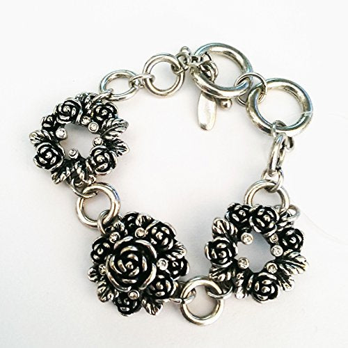 Antique look flower and diamante link bracelet.